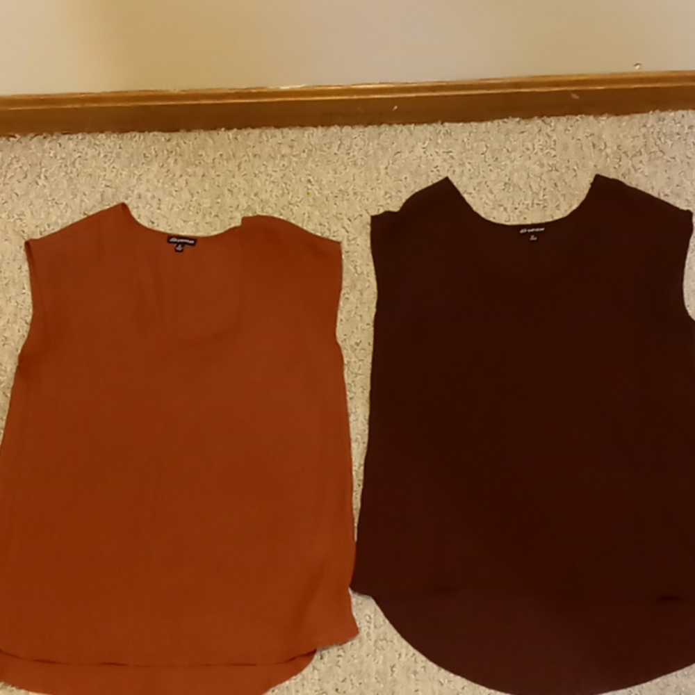 2 sleeveless polyester tops.  Perfect condition